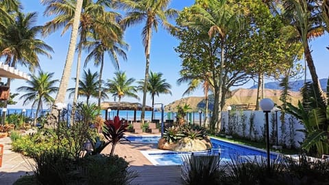Outdoor pool, open 8:00 AM to 10:00 PM, sun loungers