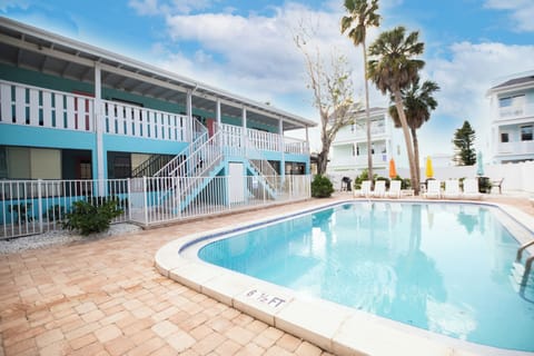 Lounge chairs  will be a welcomed place to lay while you soak in the sun at our private pool (shared amongst all 4 units).  Don't forget your sunscreen!  Feel free to bring our beach chairs and umbrellas to the beach.  The pool is heated BY THE SUN. 