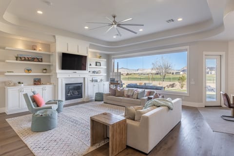Living Room View - The living room has a beautiful view of The Ledges Golf Course.