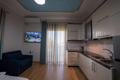 Quadruple Room with Kitchen | In-room safe, free WiFi, bed sheets