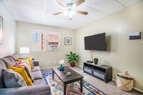 Relax and unwind in a cozy living room with a comfortable couch