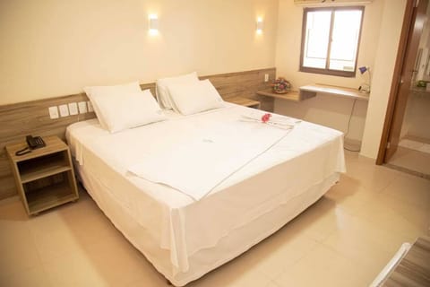 Economy Room | Minibar, desk, free WiFi, bed sheets