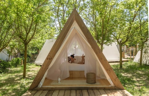 Tent | Hypo-allergenic bedding, down comforters, memory foam beds, in-room safe