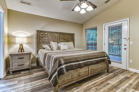 King bed, located back at the house by the deck. 