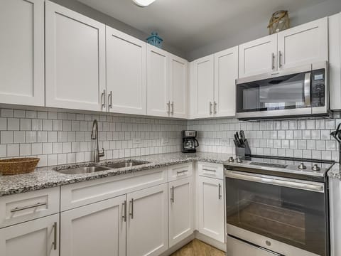 Kitchen with Stainless Steel Appliances at 1302 SeaCrest