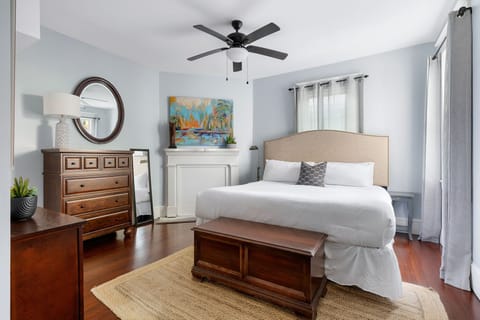 Relax in a cozy bed with crisp linens and soft pillows.