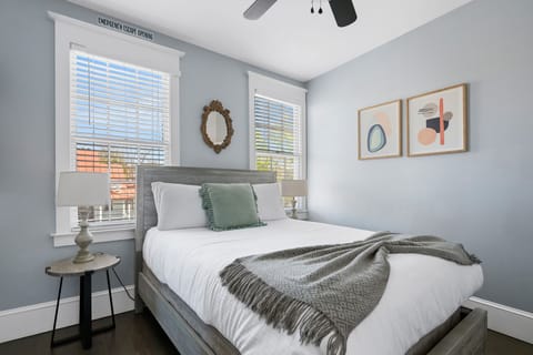 Relax in a cozy bed with crisp linens and soft pillows.