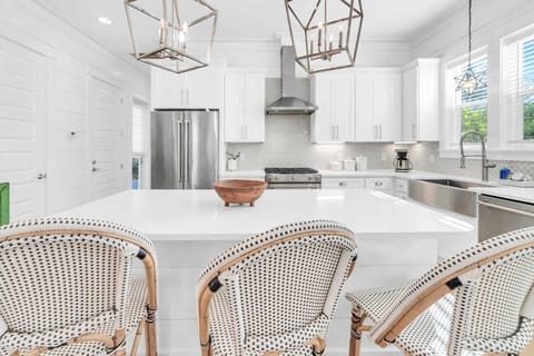 The chef's kitchen is the perfect entertaining space for your party!