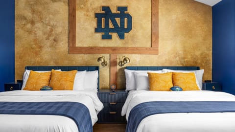 Sleep like a champion beneath the iconic Notre Dame goalpost—where game day spirit meets elevated comfort.