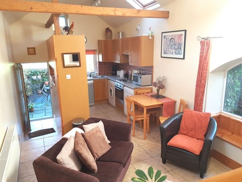 Living room and open door to patio