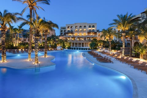 2 indoor pools, 3 outdoor pools, open 7:00 AM to 9:00 PM, pool umbrellas