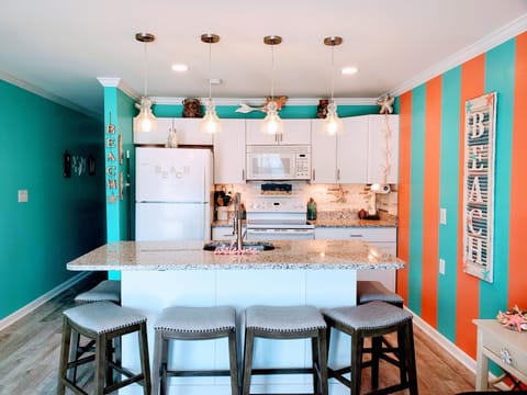 Counter height seating for six.  Granite countertops 