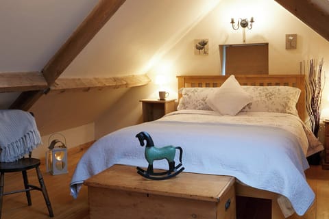 Bedroom under the eaves, lovely and cosy.