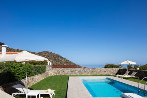 Sophisticated pool surroundings offering a sense of tranquility.