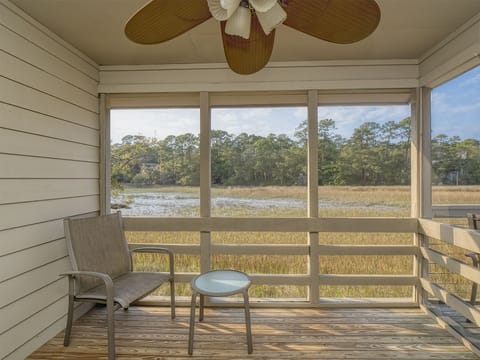 The screen porch sits off the great room.