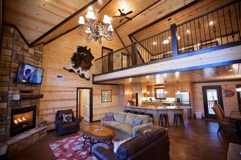 Spacious great room with loft views and warm rustic charm