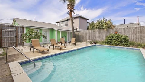 Sparkling pool with lounge chairs