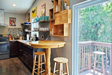 Step outside the sliding glass door onto the lookout deck.