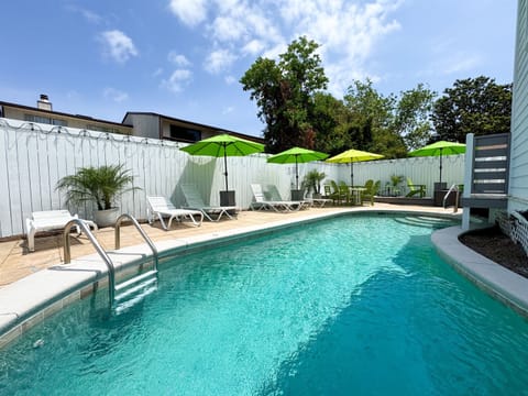A private heated pool in a beach house retreat! Perfect for family and friends to have fun together.
