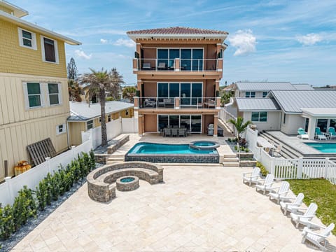 Beautiful oceanfront home with a luxurious backyard hangout.