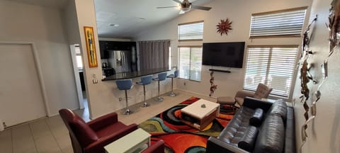 Open concept between living and kitchen.