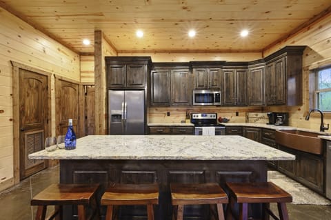 Gather around the spacious kitchen island, the perfect spot for meal prep, casual dining, and heartfelt conversations.