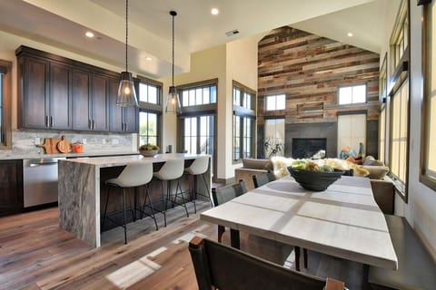 Center Island with Bar Seating and Dining Area