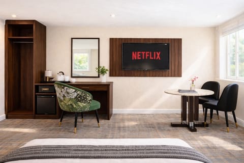 Premium bedding, down comforters, desk, laptop workspace