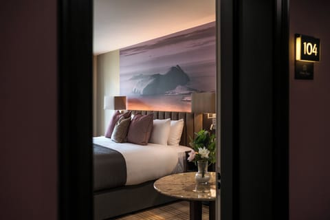 Premium bedding, down comforters, in-room safe, desk