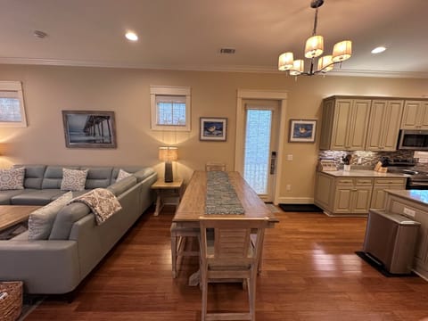 Dining Table seats 6 easily with seating for 2 more at the Kitchen Island.