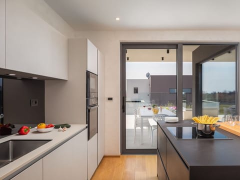 Cabinetry, Countertop, Tap, Kitchen Sink, Building, Sink, Kitchen Stove, Window, Table