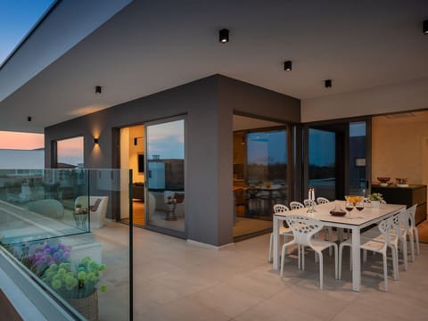 Building, Furniture, Table, Property, Chair, Plant, Shade, Door, Lighting