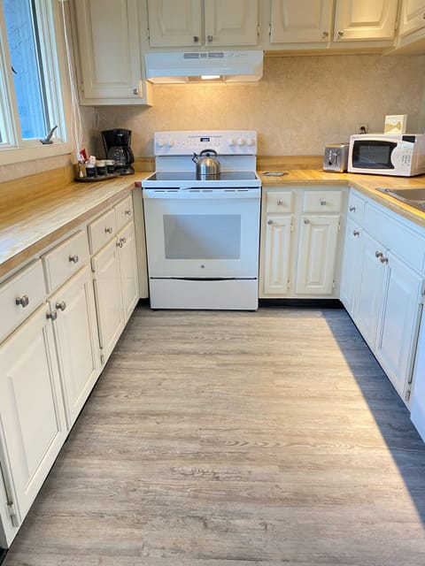 Fully stocked Kitchen with new oven and new dishwasher 