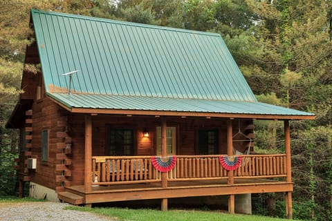Dogwood Cabin offers a delightful, private retreat where beauty and peace abound, and couples can unwind under the trees,