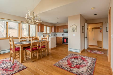 Dining/ living room windows draw in plenty of natural sunlight