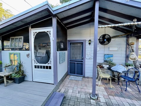 Front door on right with keyless entry. Door on left leads to shared laundry. 