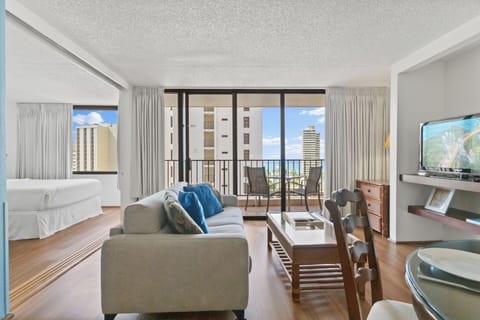 Living Room - Amazing views from your living room.  Comes with a pull-out sofa bed for extra guests and flat-screened TV.