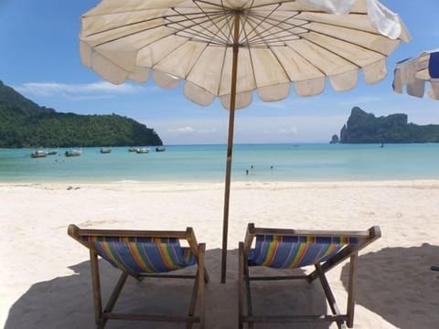 Beach nearby, beach umbrellas, beach bar, fishing