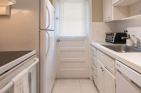 Galley kitchen includes all major full size appliances