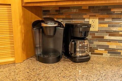 A Kurieg and coffee pot are provided for you.