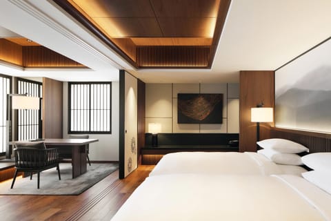 Suite, 2 Twin Beds | Desk, laptop workspace, iron/ironing board, free cribs/infant beds