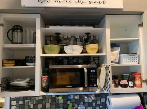 Fully stocked kitchen includes spices, coffees/teas, oatmeal, peanut butter.