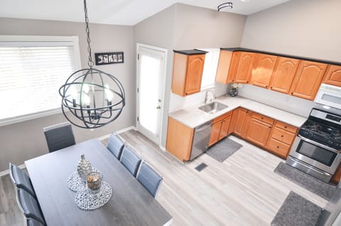 There is a large Skylight that fills this area w/ natural lighting.