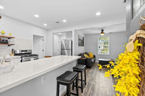 When you and your guests walk in you all will see this beautifully updated kitchen before entering a modern living space.
