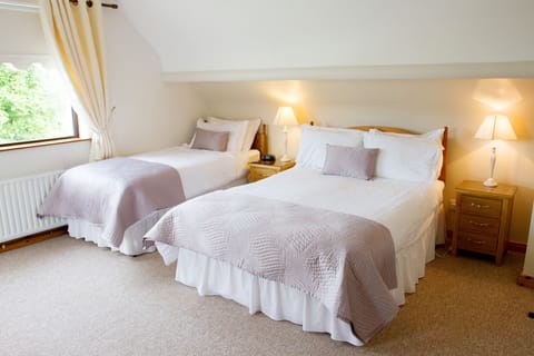 Select Comfort beds, blackout drapes, iron/ironing board, free WiFi