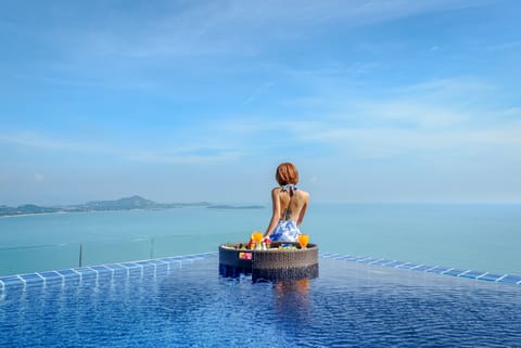 Outdoor pool, open 7:00 AM to 8:00 PM, pool umbrellas, sun loungers
