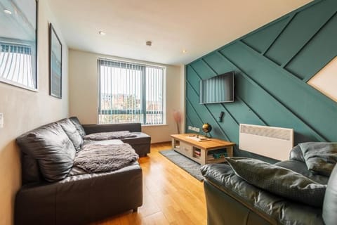 Deluxe Apartment | Living area | 32-inch flat-screen TV with digital channels, TV