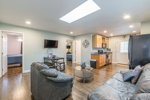 Lots of natural sunlight in the living room with skylight