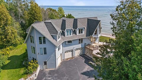 Stunning waterfront retreat with elevated deck and panoramic lake views