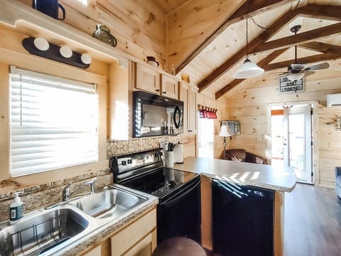 fully equipped kitchen including hand mixer, blender, crock pot, etc.